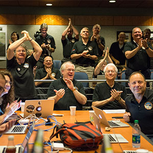 Part of the New Horizons team celebrating the spacecraft's flyby of Pluto.
